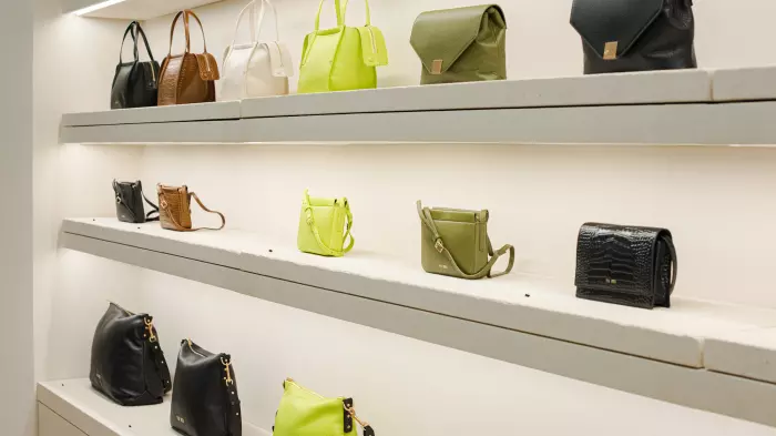 Morrison family trust ups stake in Yu Mei handbags