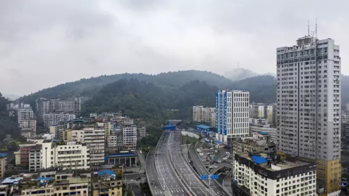 China's hidden-debt woes laid bare in half-built roads, housing