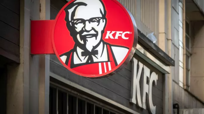 KFC operator's shares marginally down on big profit fall