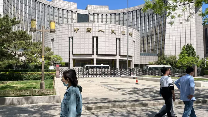 China cuts short-term policy rate as recovery weakens