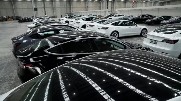 Tesla reports higher profit in third quarter