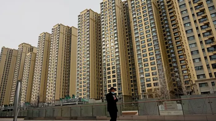 China Evergrande fraudulently boosted sales, regulator says