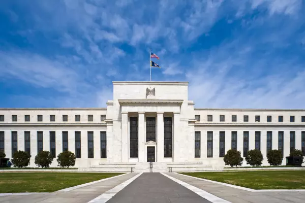 Fed to slow interest rate cuts after quarter-point reduction