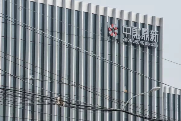 China shadow bank misses dozens of payments as risks grow