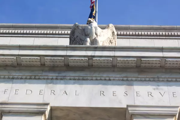 US Fed cuts rates again, this time by a quarter point