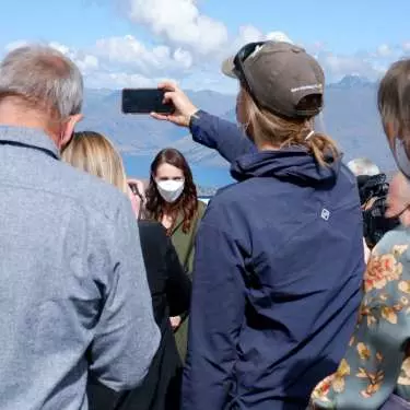 Not just a photo op: Ardern woos back tourism