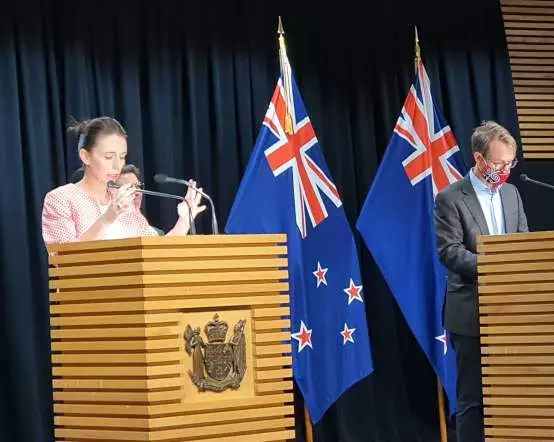 NZ's moving to red as Omicron's here: 'get boosted' urges Ardern