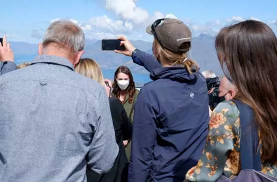 Not just a photo op: Ardern woos back tourism