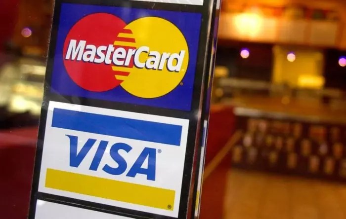 Visa, Mastercard agree to lower swipe fees, settling long-running lawsuit