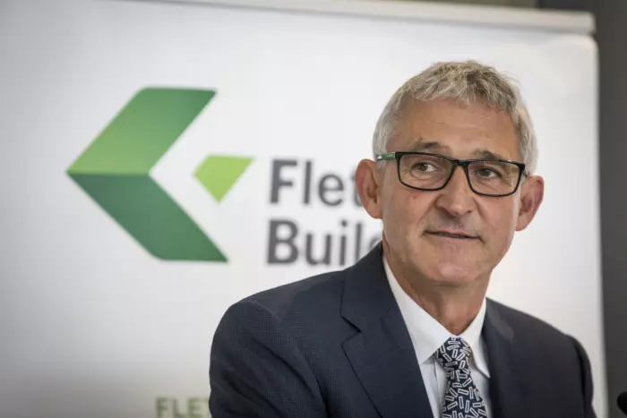 NZ market edges up while Fletcher Building goes into trading halt