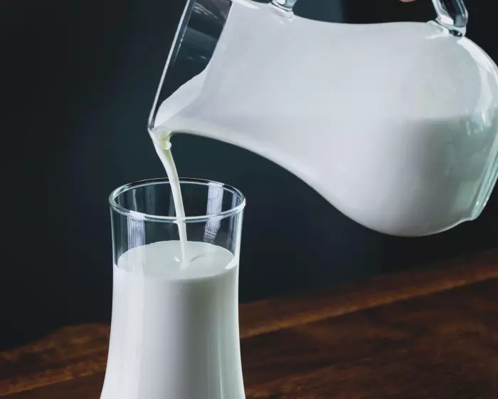 Shares flat and dollar higher as dairy prices boom