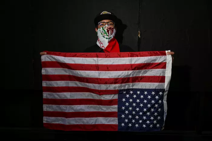 The twin masks of protests and raids, fear and truth
